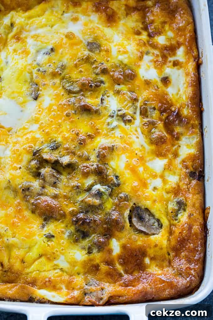 Spicy Sausage and Caramelized Onion Breakfast Casserole in baking dish