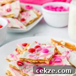 Valentine's day cracker toffee on a white plate.