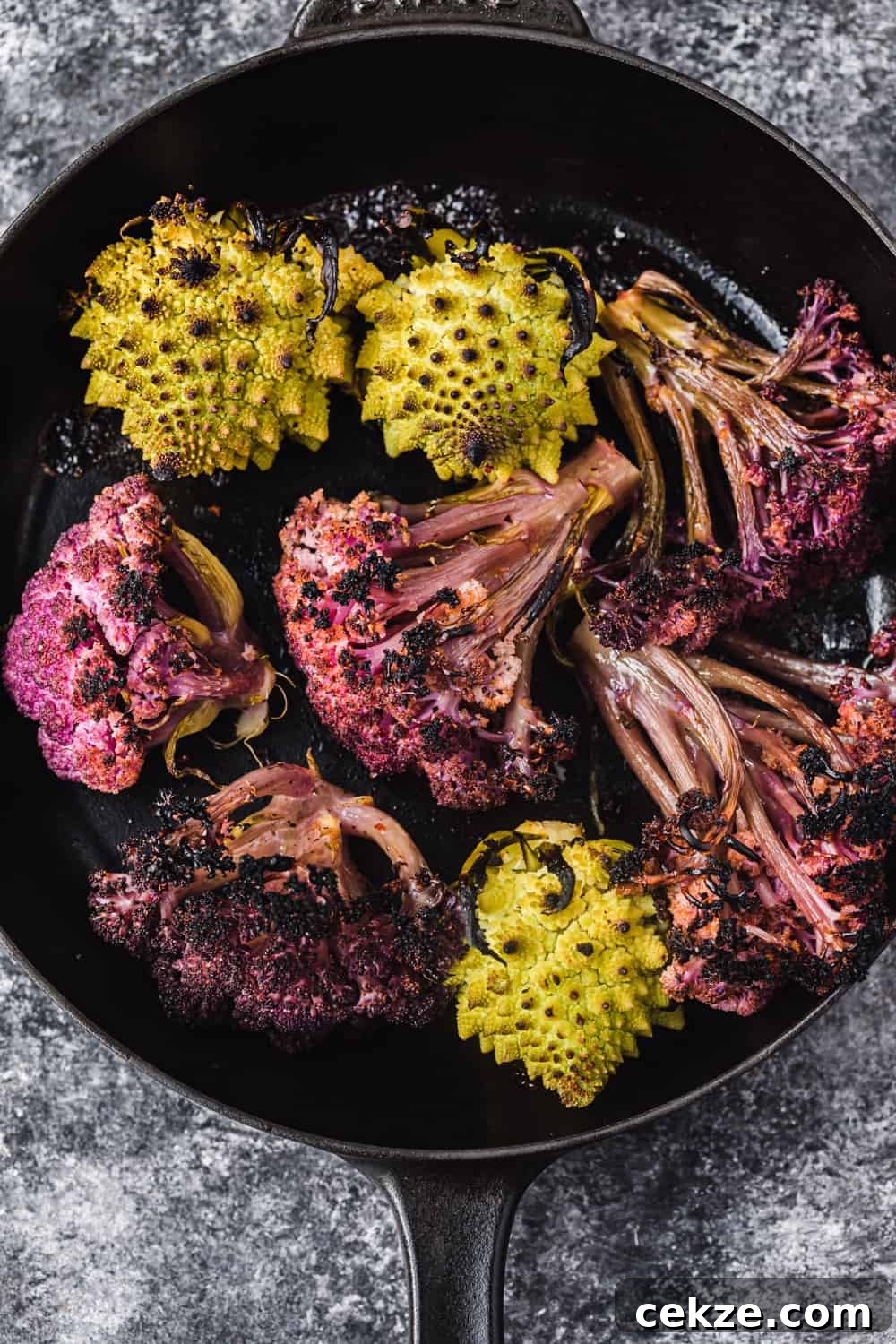 charred purple cauliflower and romanesco, just out of the oven to be used in the farmers market salad to be used in the farmers market salad