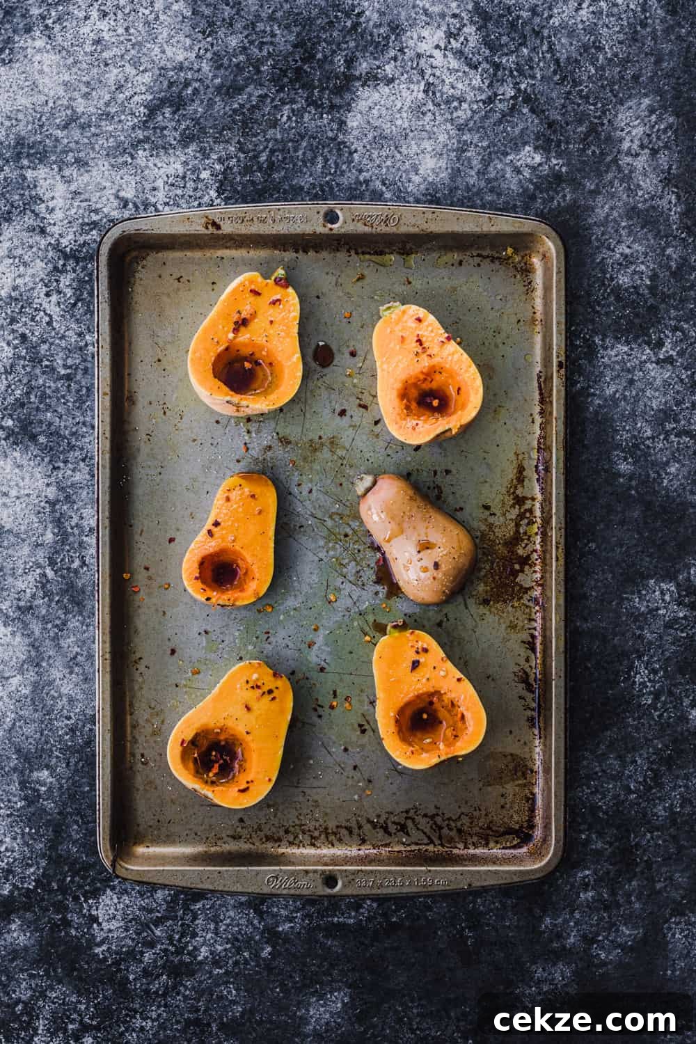 butternut squash, with honey and olive oil, ready to go in the oven and used in the farmers market salad