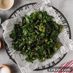 Crispy Air Fryer Spinach on parchment paper