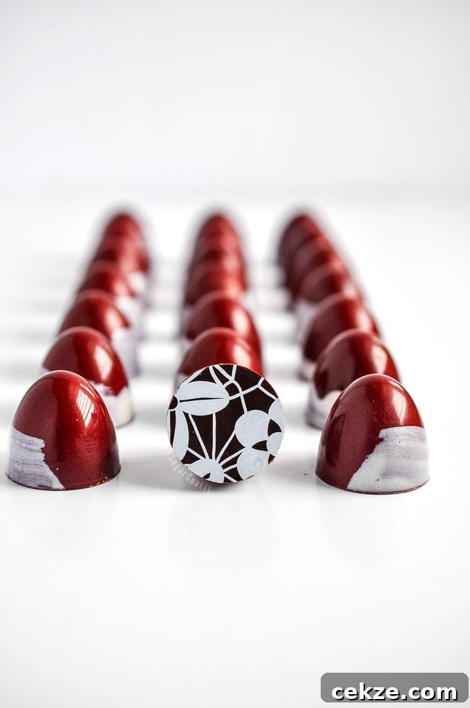 Berry Carambola Cheesecake Bites: Tropical Starfruit Dessert Bonbons 4 Berry Carambola Cheesecake Bonbons are an exquisite blend of silky cheesecake ganache, topped with sweet tangy carambola (starfruit) jam.