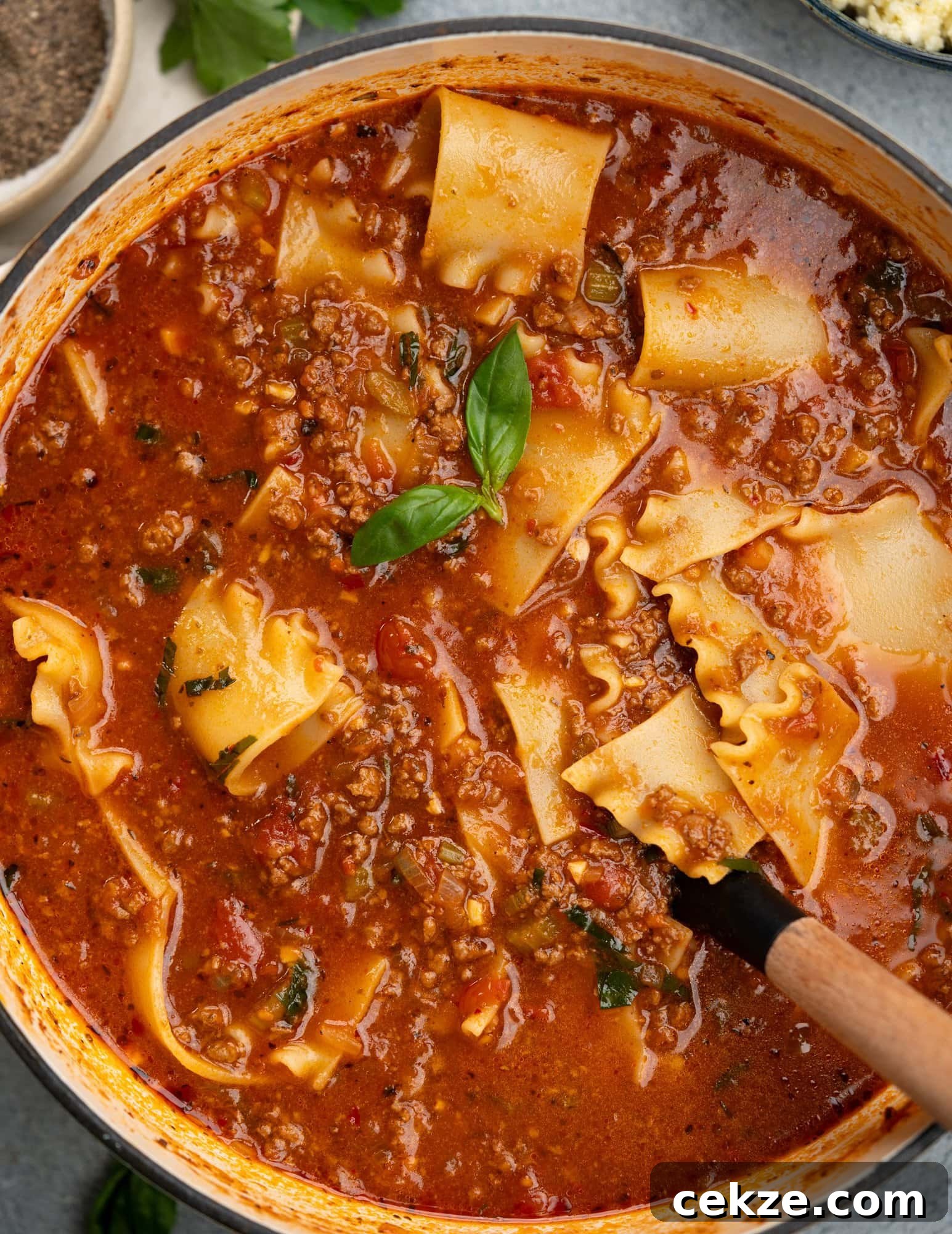 Hearty Lasagna Soup Recipe: Comfort in a Bowl 2 One pot Lasagna Soup in a large soup pot with beef, tomato base and lasagna noodles.