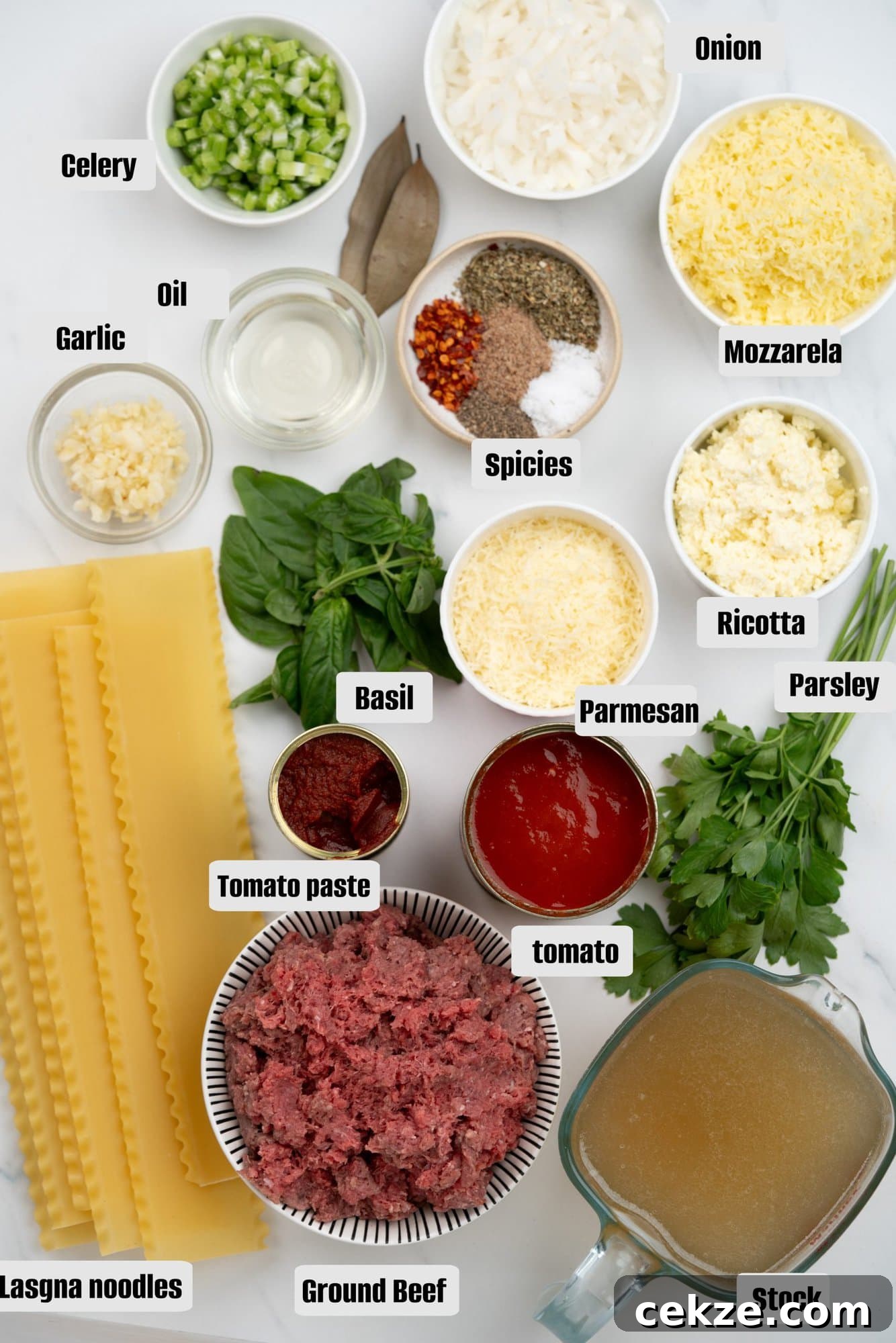 Hearty Lasagna Soup Recipe: Comfort in a Bowl 4 Ingredients for Lasagna Soup - Ground beef, Dried noodles, crushed tomatoes, tomato paste, onion, celery, garlic, chicken stock, seasoning, ricotta , parmesan, Mozzarela, basil and parsley .