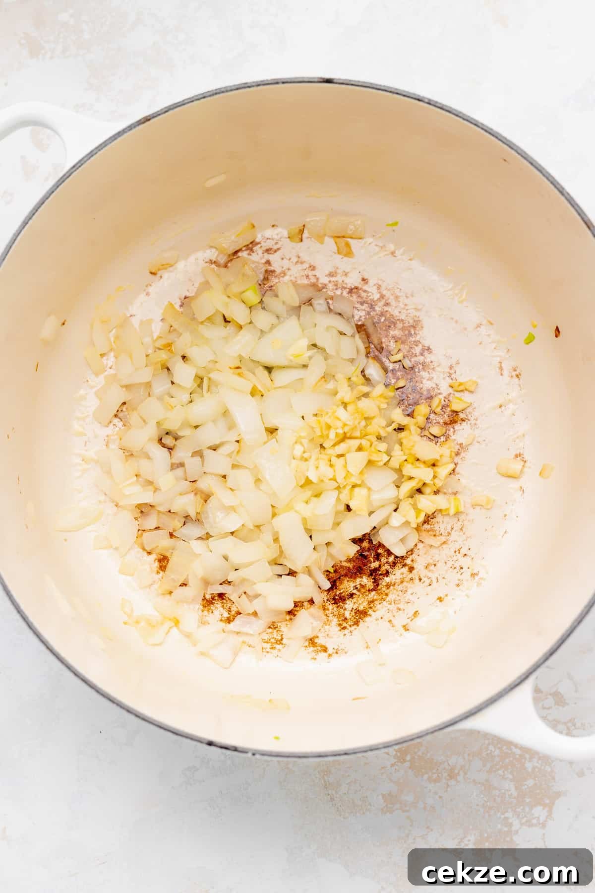 Onions and garlic in pan.