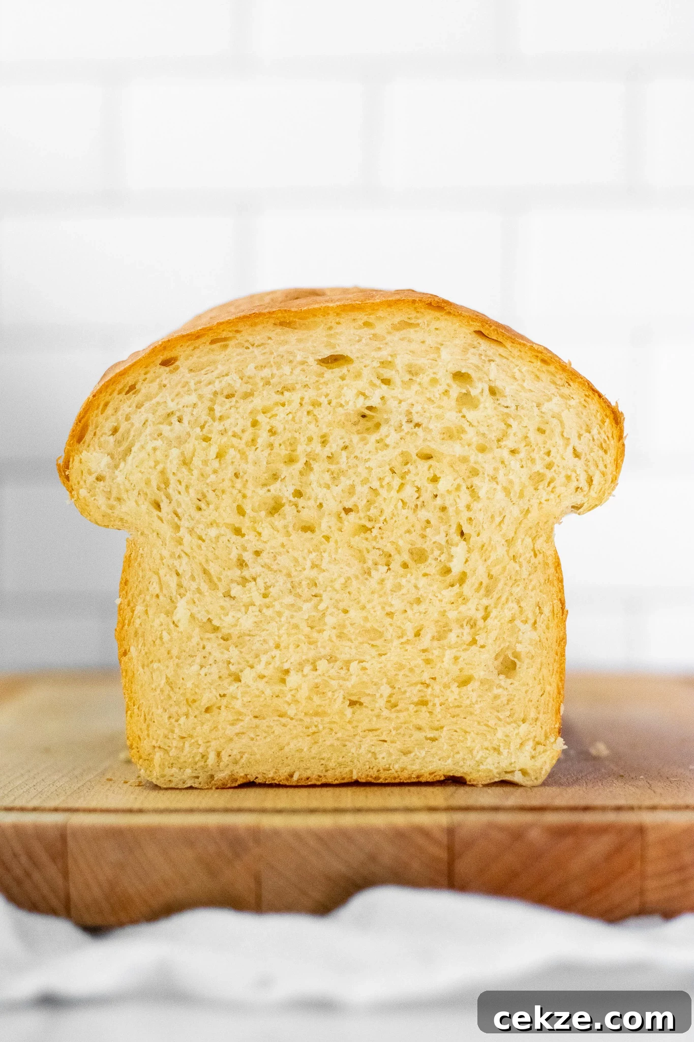 A cross section of a loaf of potato bread.