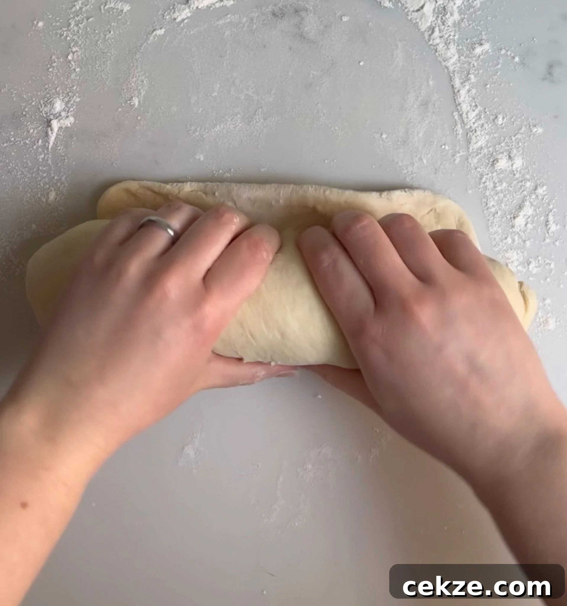Rolling up the loaf.
