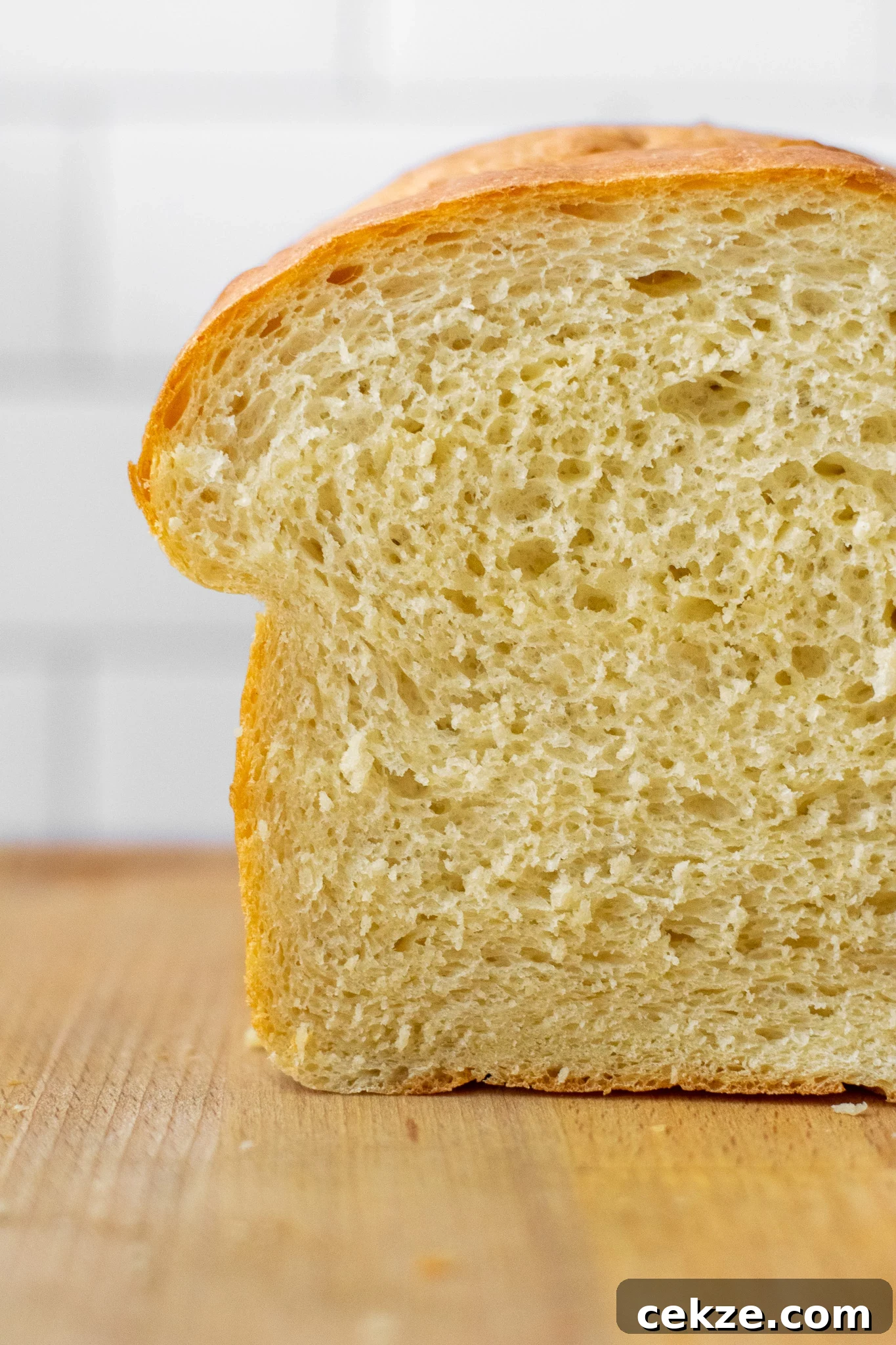 A cross section of a loaf of potato bread.