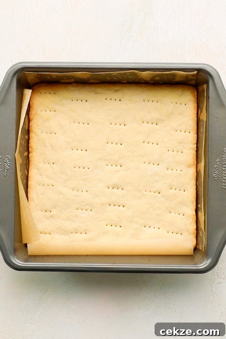 Baked shortbread crust in a 9x9-inch pan.