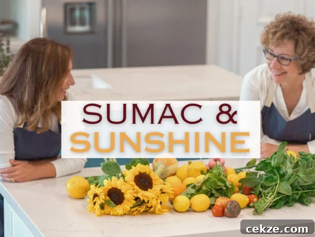 Instant Pot Zereshk Polo — Persian Barberry Rice Recipe 14 Sarene Wallace and Beth Lee leaning on a white kitchen counter with lots of fresh produce in front of them and words in the center that say Sumac & Sunshine.