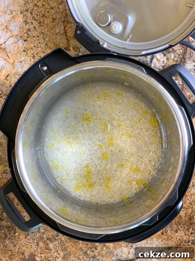 Instant Pot Zereshk Polo — Persian Barberry Rice Recipe 7 Uncooked basmati rice in instant pot.