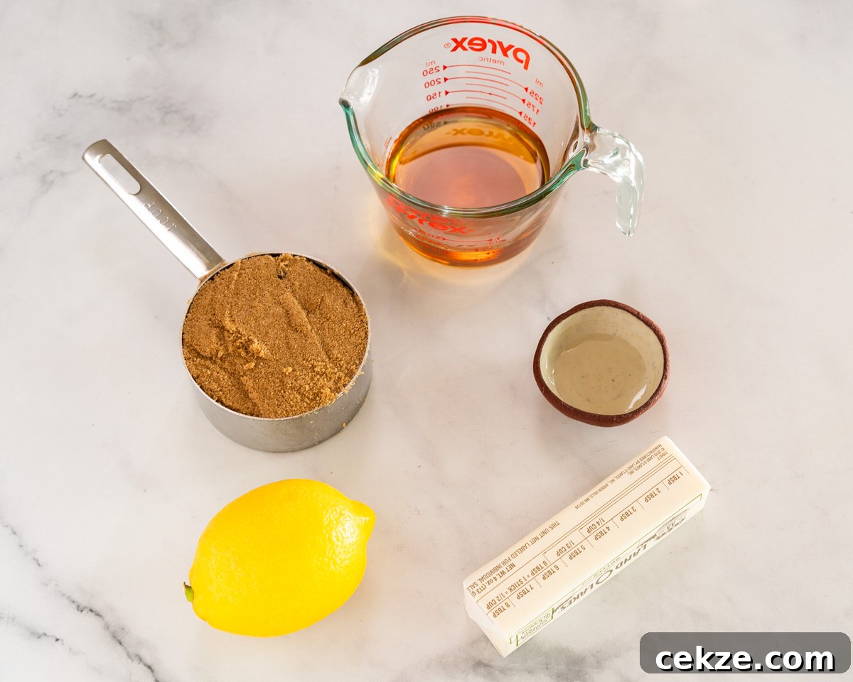 Authentic Cuban Rum Cake Recipe: Moist Drunken Cake with Rum Glaze 4 Ingredients used to make rum syrup including brown sugar, butter, lemon, brown sugar, rum, and light corn syrup. Hostess At Heart