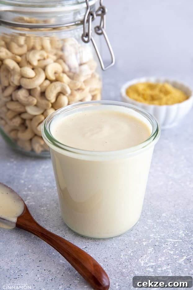 25 Must-Try Recipes from 2020: Top Fan Favorites 21 side view of a small container with vegan cashew alfredo sauce