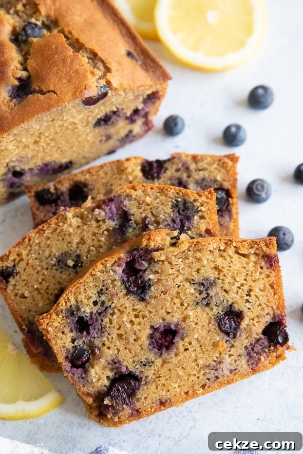 25 Must-Try Recipes from 2020: Top Fan Favorites 7 a sliced loaf of paleo almond flour lemon blueberry bread