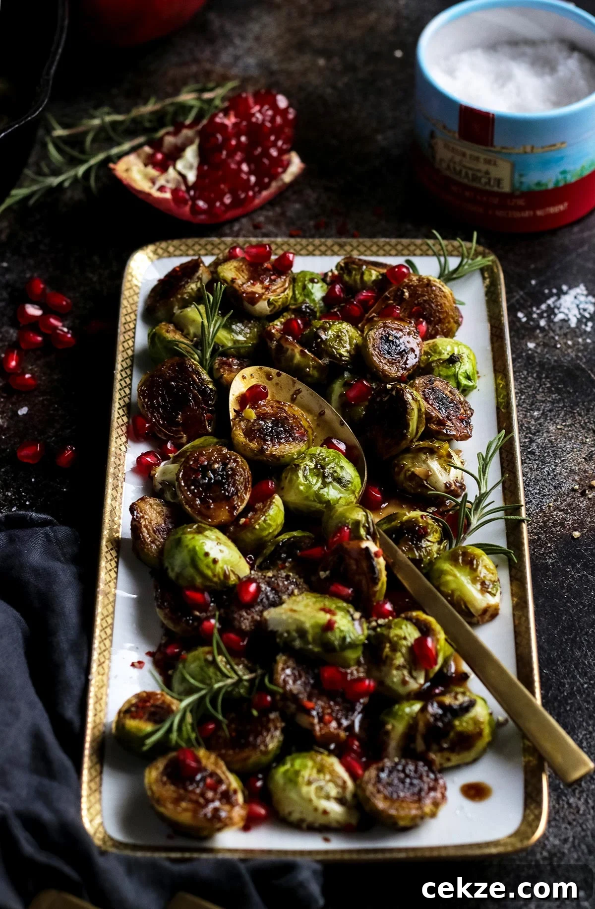 Maple Glazed Brussel Sprouts Garnished with Pomegranate Seeds.