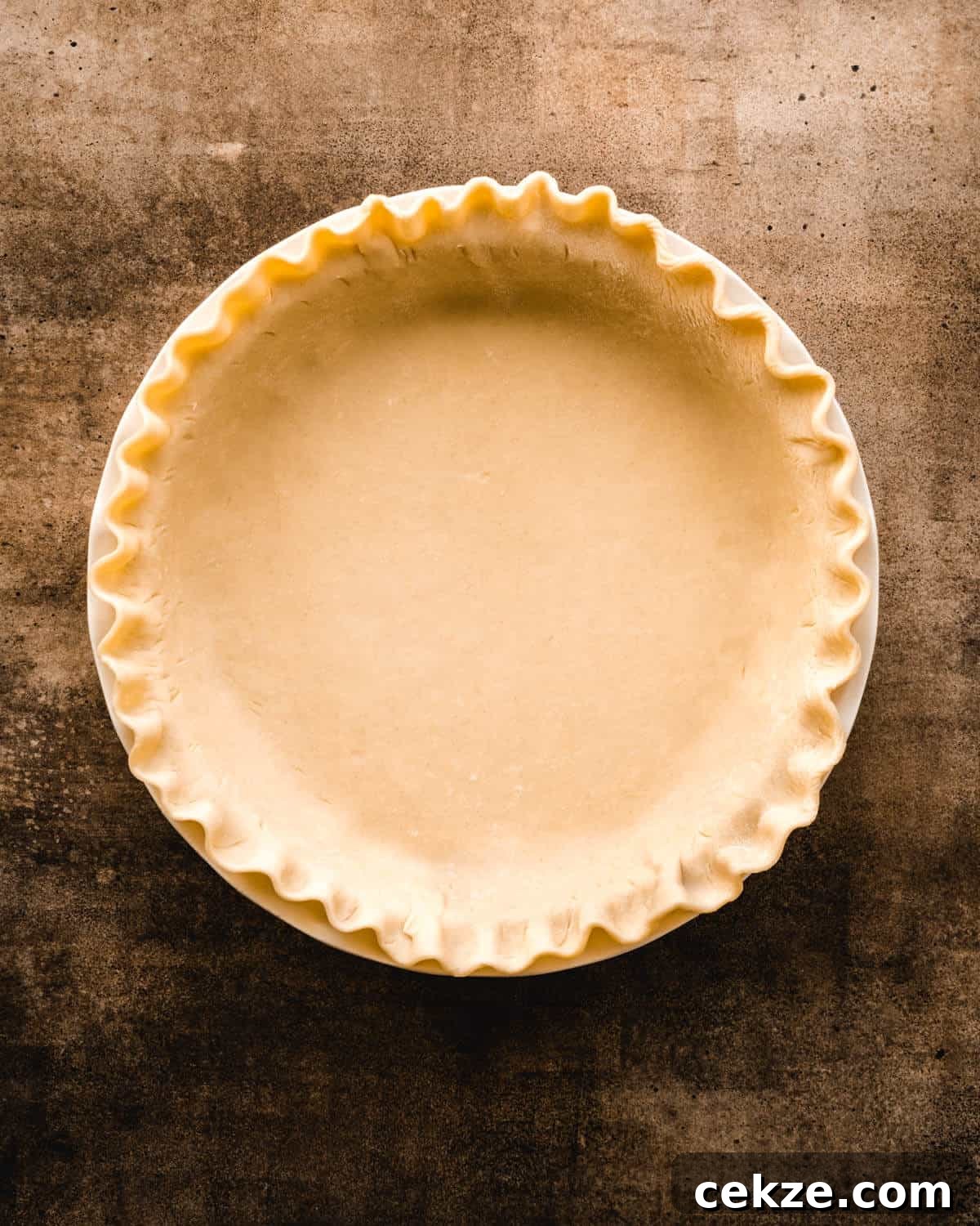 Ultimate Chocolate Chip Cookie Pie Recipe for Every Occasion 5 Unbaked Ppie crust with fluted edge.
