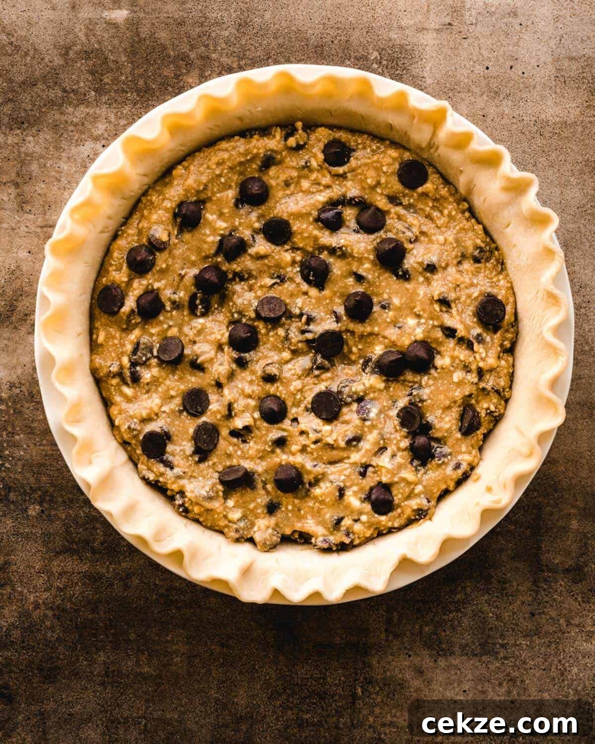 Ultimate Chocolate Chip Cookie Pie Recipe for Every Occasion 6 Top view of an unbaked chocolate chip pie.