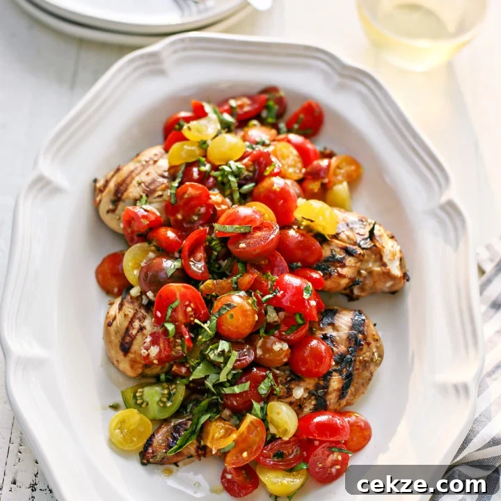 bruschetta chicken on a white platter