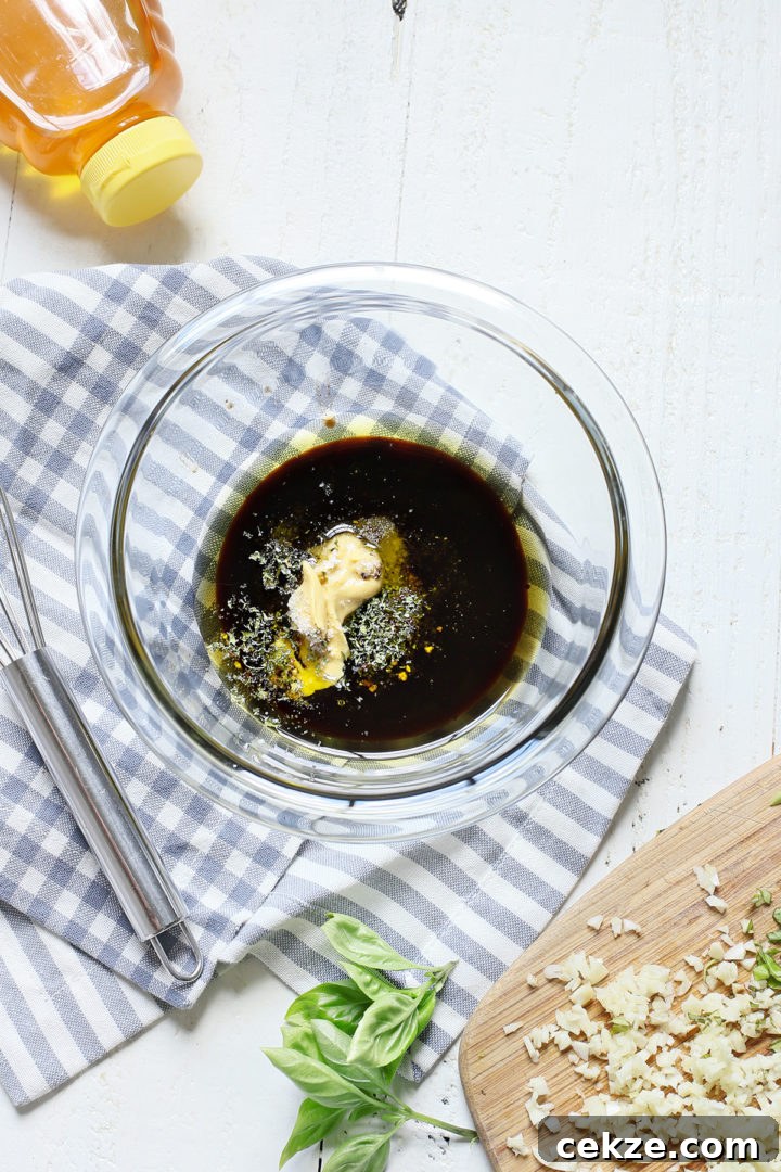 marinade for grilled bruschetta chicken in a glass bowl