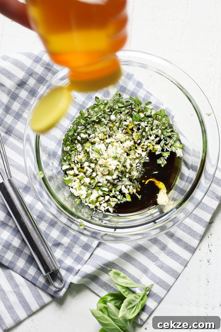 basil and balsamic vinegar in a glass bowl for grilled bruschetta chicken