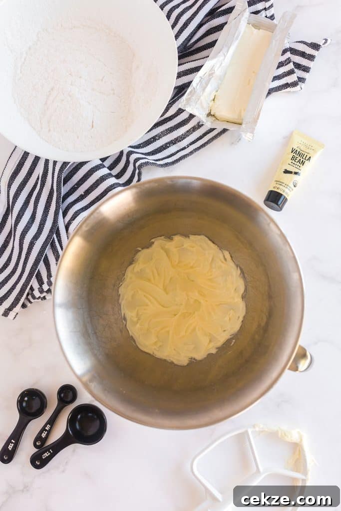fluffy butter in the bowl of an standing mixer