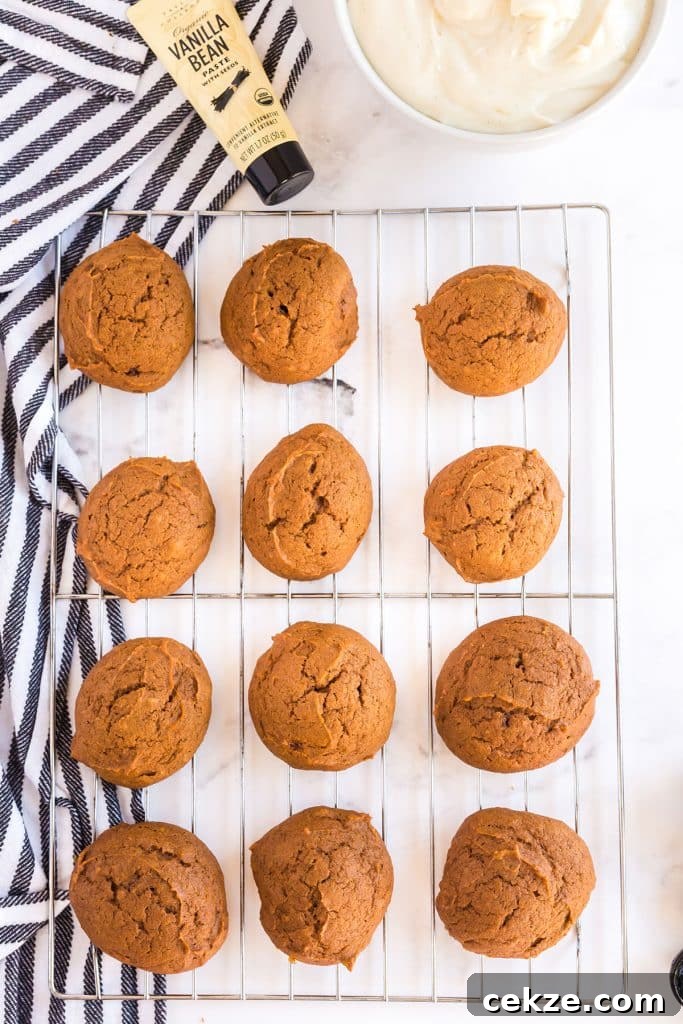 twelve whoopie pie cookies on a cooling rack