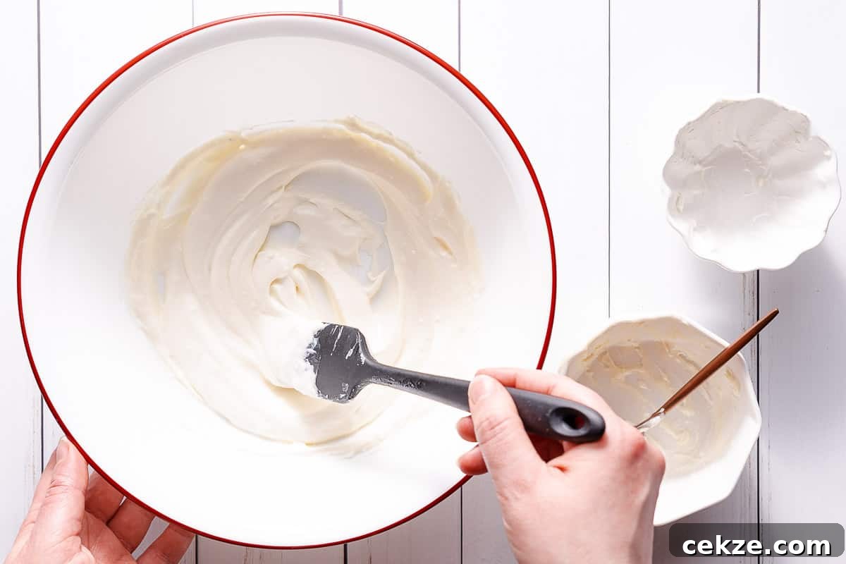dressing being mixed in large bowl