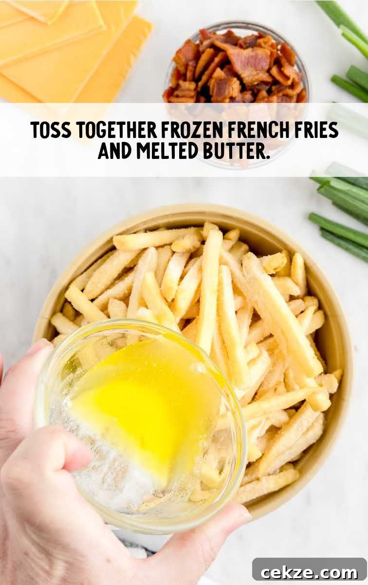 Loaded Dirty Fries Recipe: Crispy Fries Topped with Cheese & Bacon 4 French fries and melted butter tossed together in a bowl