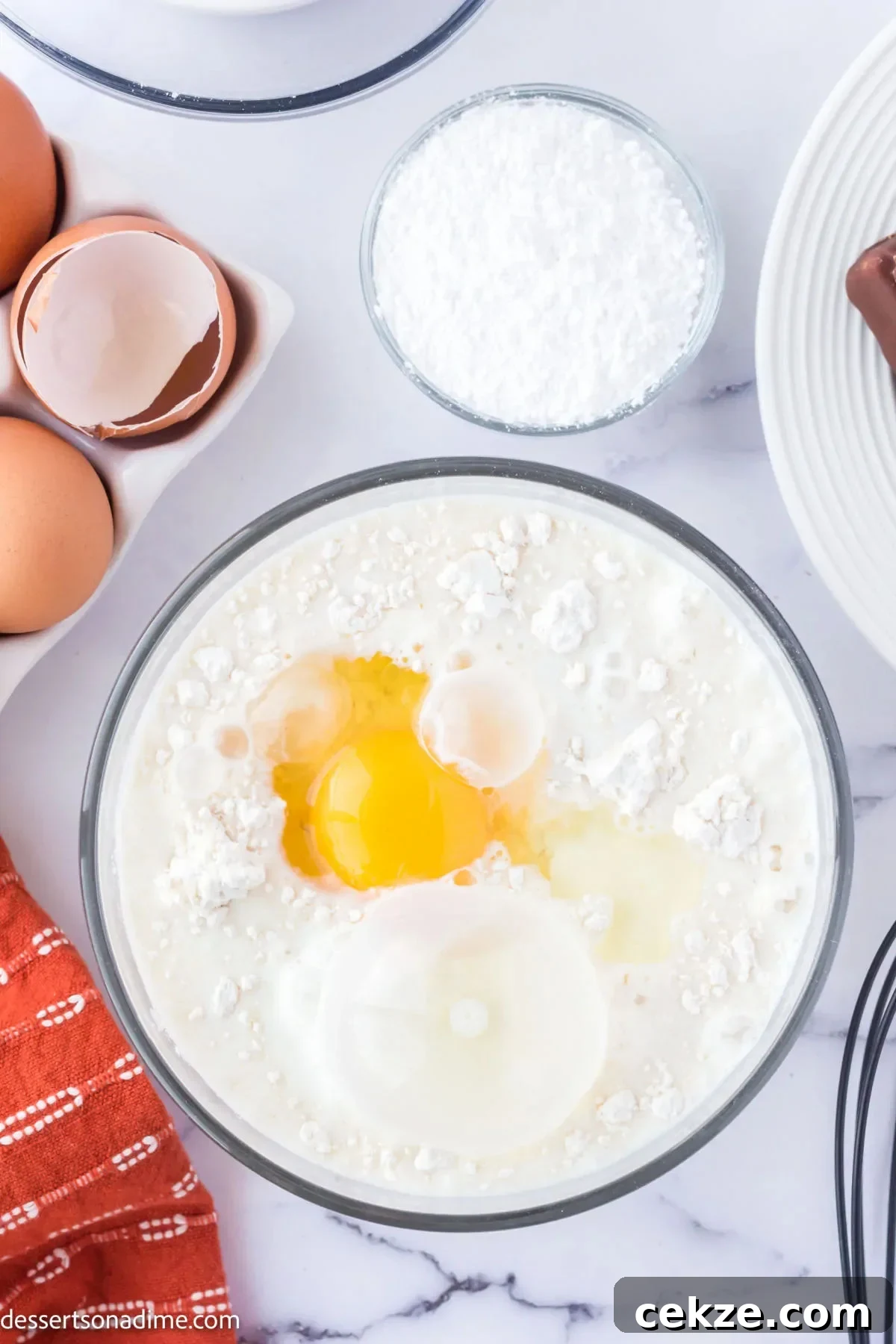 Crispy Deep-Fried Snickers: How to Make the Perfect Indulgent Treat 4 Bowl of pancake batter with egg added.