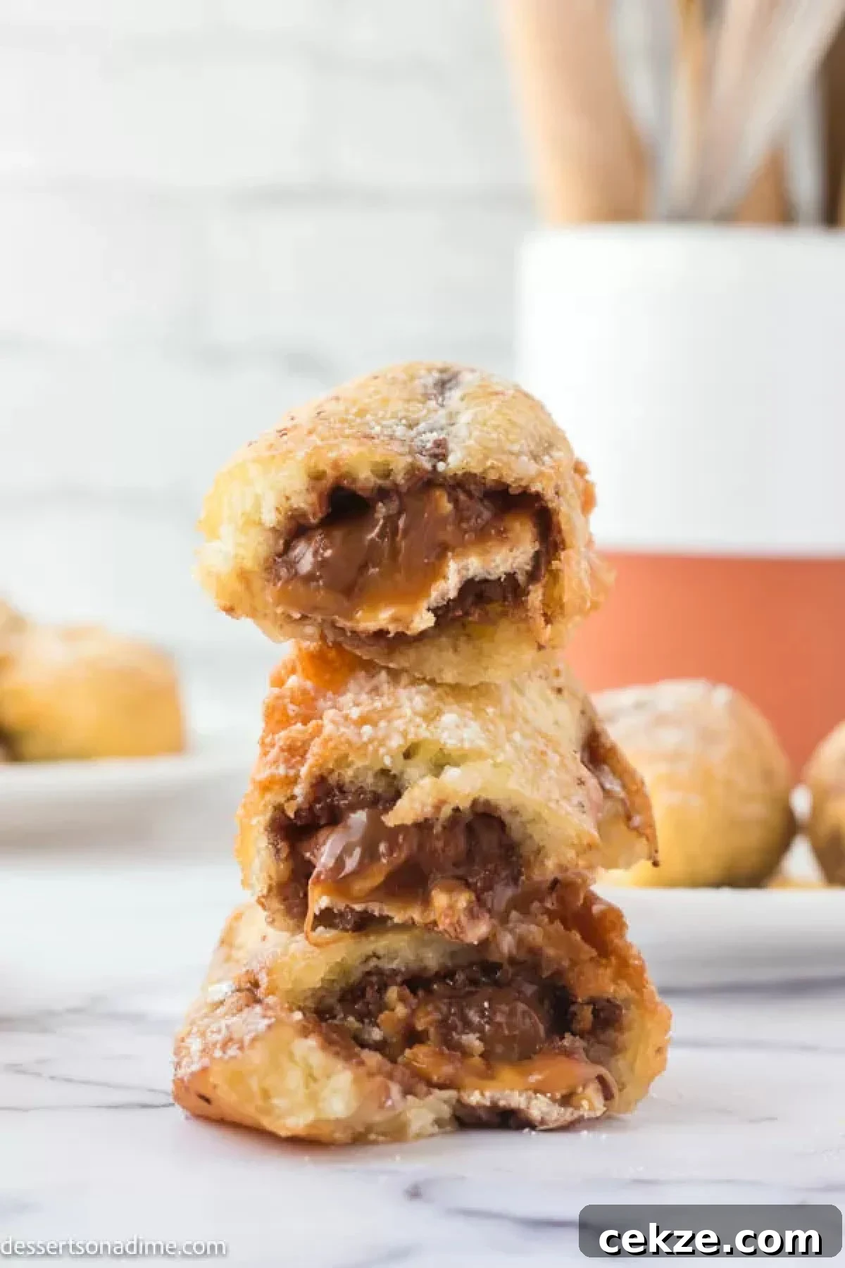 Crispy Deep-Fried Snickers: How to Make the Perfect Indulgent Treat 9 Fried Snickers stacked together.