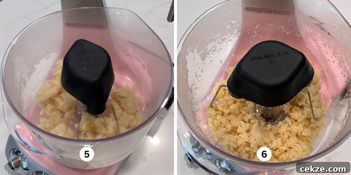 How to Make Classic Cream Puffs: Light Choux Pastry Recipe 7 Beating steam out of choux pastry in a cloudy pink colored Ankarsrum assistent original mixer.