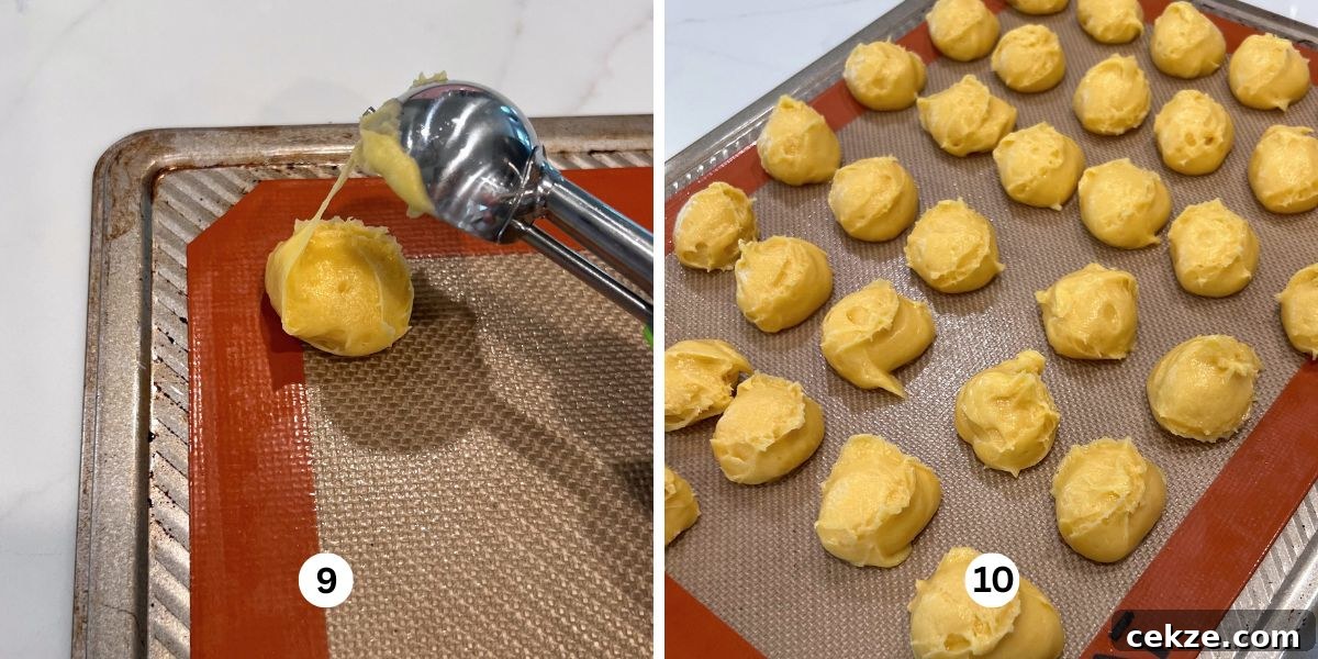 How to Make Classic Cream Puffs: Light Choux Pastry Recipe 9 Scooping cream puff choux pastry dough onto silicone lined cookie sheet using a one tablespoon sized cookie sccop.