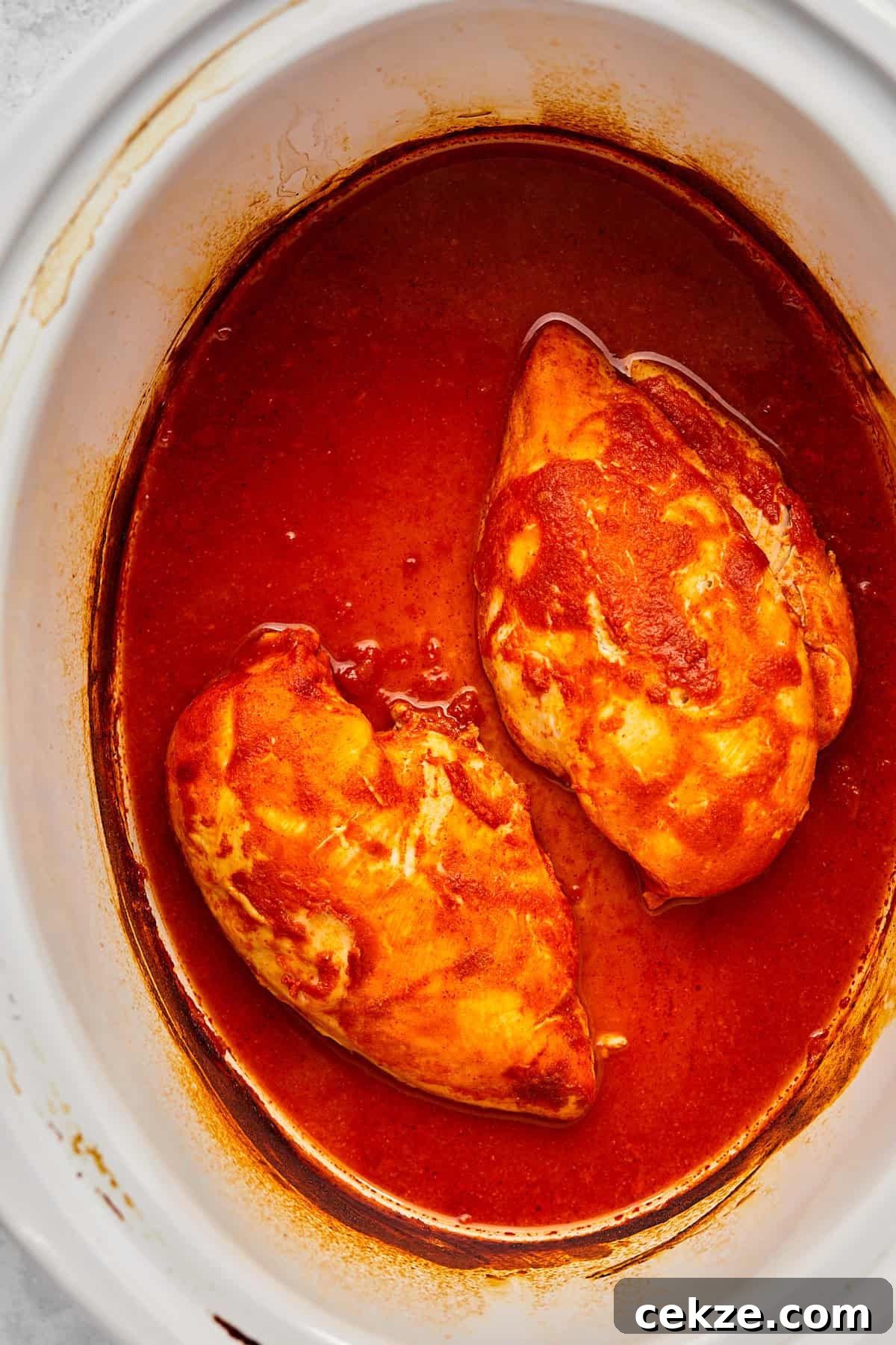 cooked chicken in buffalo sauce