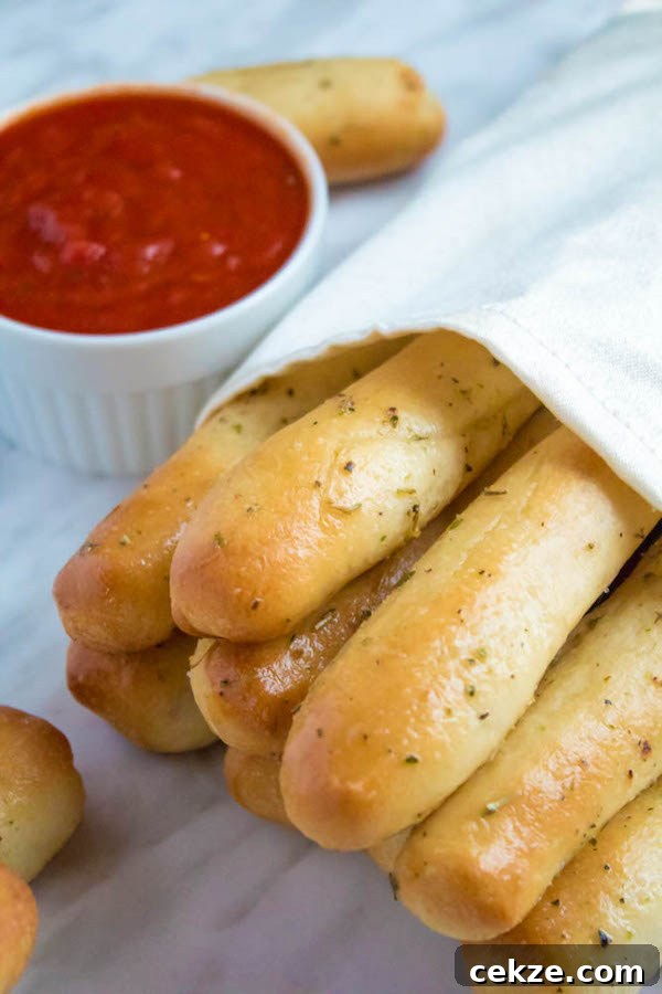 These Homemade Garlic Butter Breadsticks are soft, fluffy and buttery