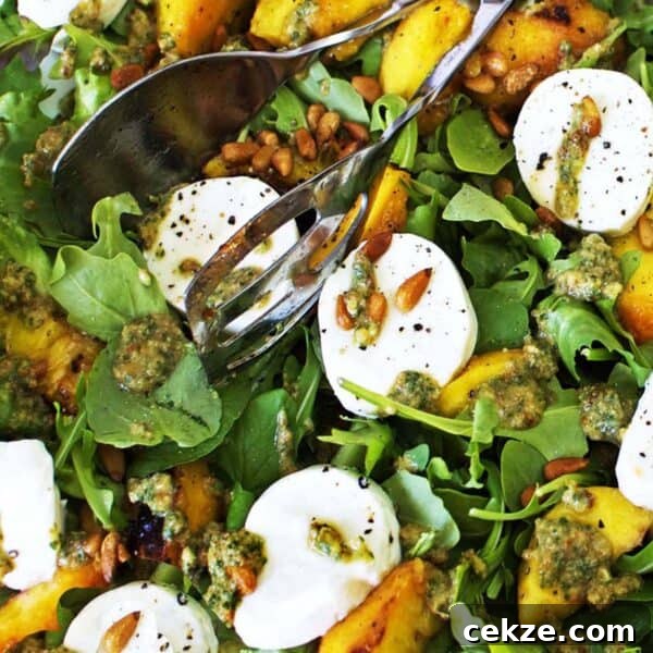 Some salad with peaches.
