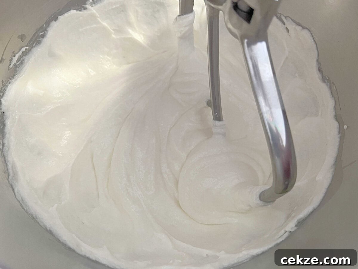 Decadent Strawberry Velvet Cake Recipe with Cream Cheese Frosting 3 Cake batter.
