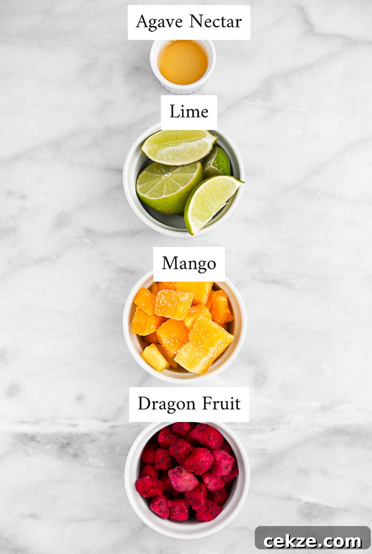 Refreshing Dragon Fruit Popsicle Recipe for Summer Treats 3 Labeling ingredients including: agave nectar, lime, mango, dragon fruit