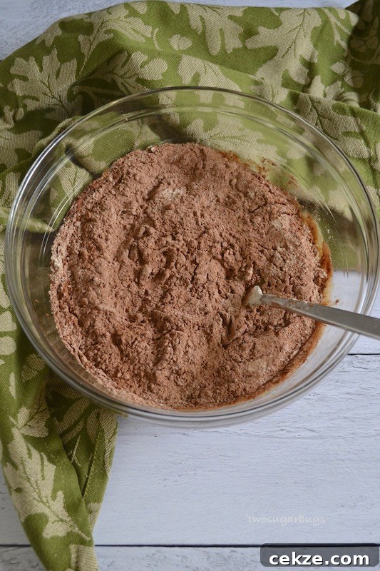 Chocolate Zucchini Bread with Less Sugar and Moist Texture 7 Dry ingredients in a glass bowl