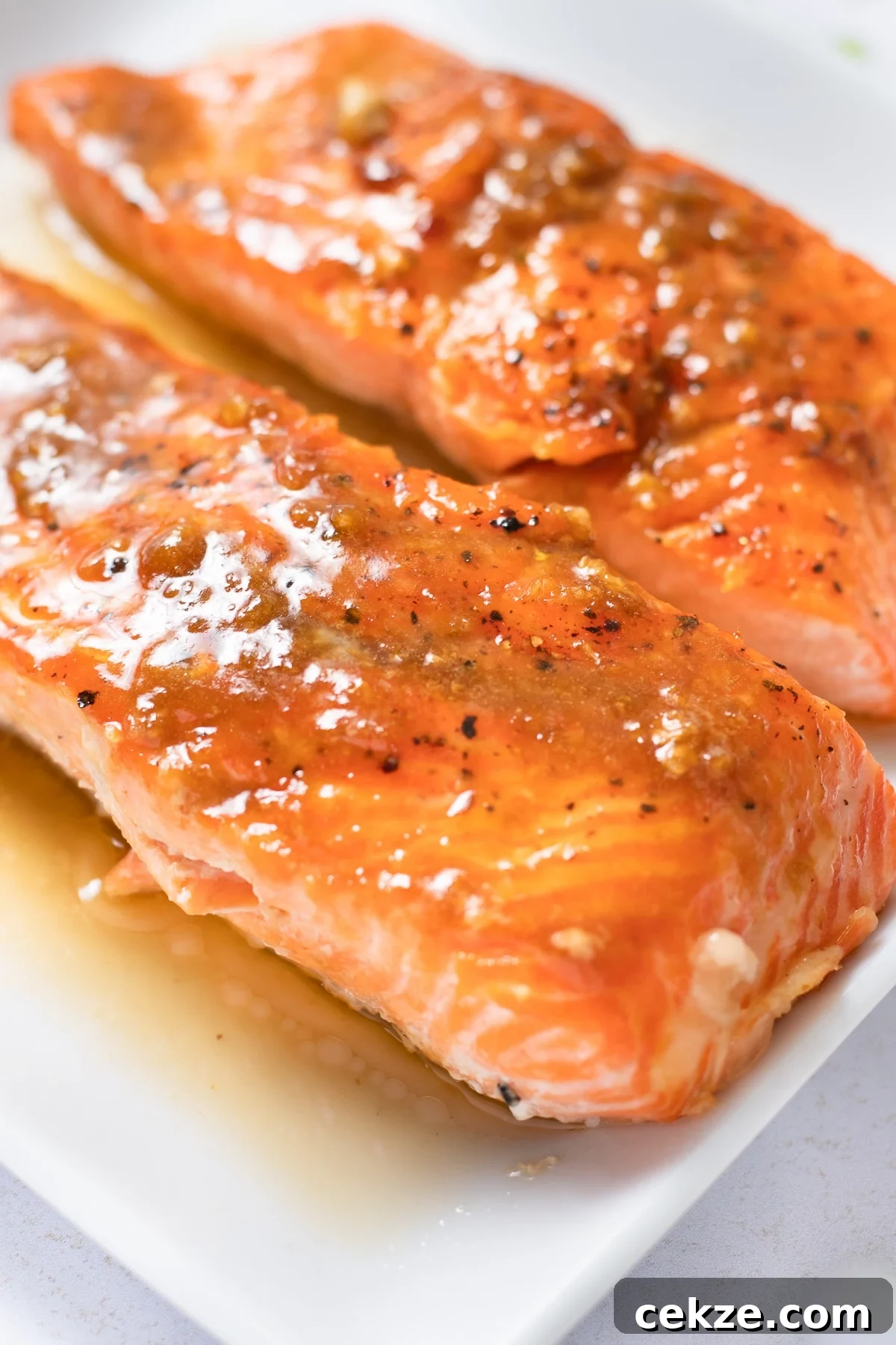 Close up shot of salmon fillets with miso butter glaze