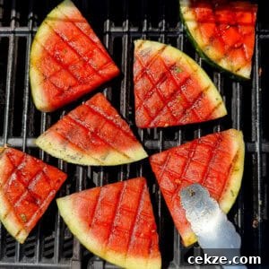 Grilled Watermelon Recipes: Sweet, Smoky Fruit for Summer BBQs 14 Grilled Watermelon with char marks and honey lime glaze