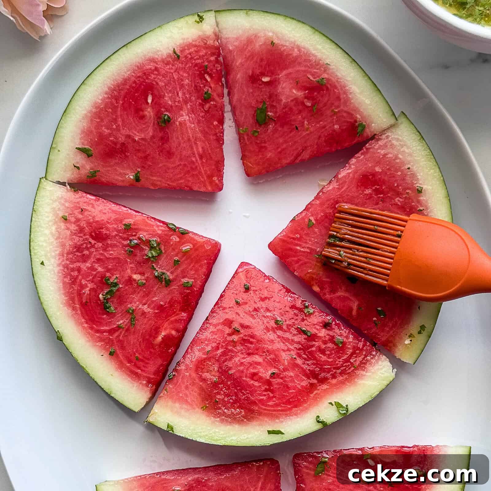 Grilled Watermelon Recipes: Sweet, Smoky Fruit for Summer BBQs 8 Brushing Watermelon with Honey Lime Cilantro Glaze
