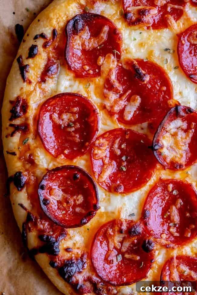 Classic Homemade Pizza Sauce Recipe for Perfect Pies 12 easy pizza recipe with pepperoni on top.