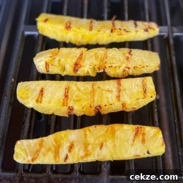 Grilled Pineapple Recipes and Tips for Perfect Caramelized Rings 7 raw pineapple on grill no sugar glaze