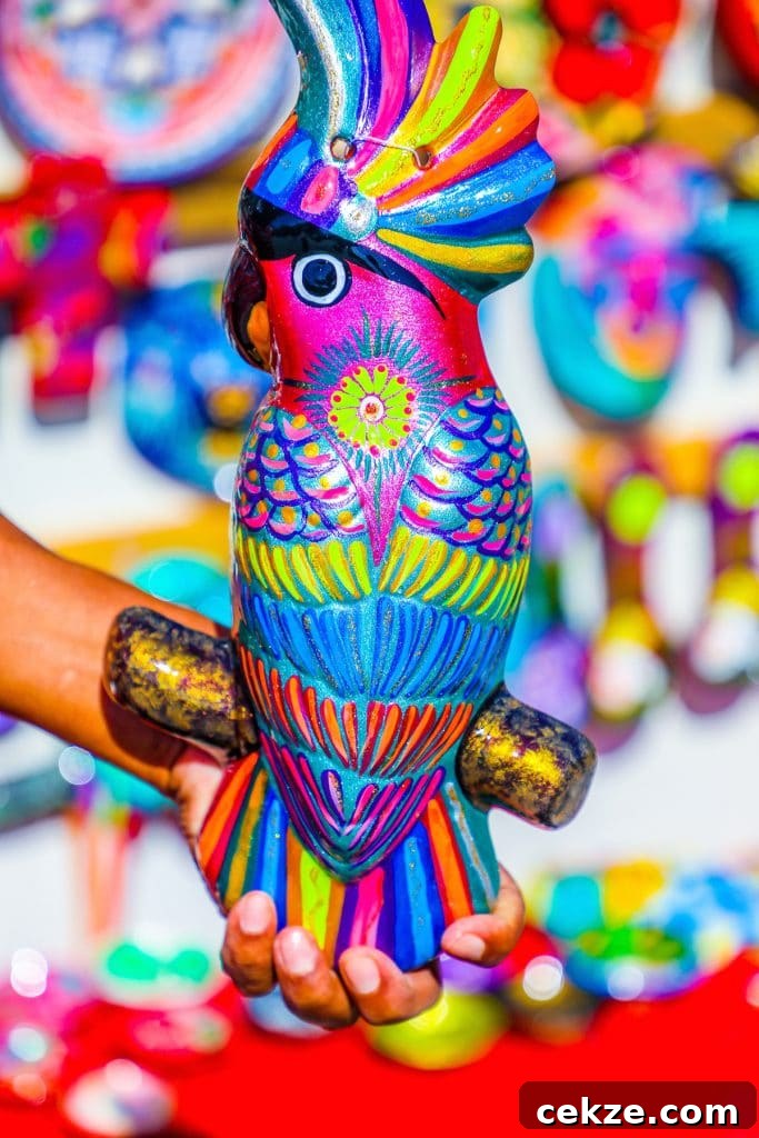 Person holding artisan bird figurine