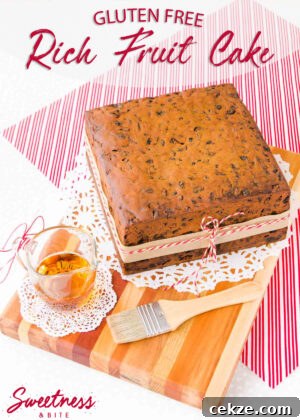 Devil’s Food Cake: Gluten-Free or Classic Recipe Explained 6 A gluten free fruit cake sitting on a wooden board, with a red and white striped cloth underneath.