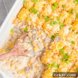 Hearty Cowboy Casserole: Cheesy Ground Beef & Potato Bake 11 Cowboy Casserole is an easy and comfort-food dinner with simple ingredients like ground beef, corn, cheese, and sour cream, then topped with delicious tater tots.