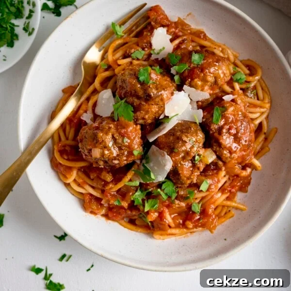 Curry-Roasted Chicken with Crispy Skin and Aromatic Spices 16 Spaghetti and meatballs in tomato sauce in a white bowl.