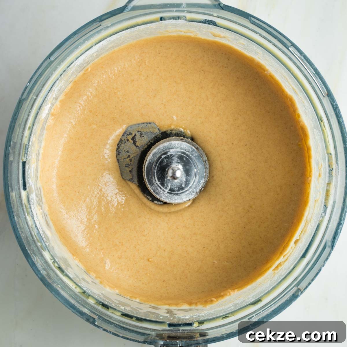 Sweet Round Challah Recipe: Soft, Shiny Braided Dinner Bread 12 Tan colored creamy mixture on the way to becoming dough.