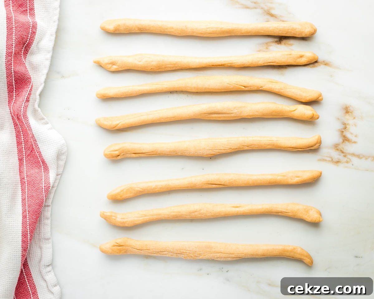 Sweet Round Challah Recipe: Soft, Shiny Braided Dinner Bread 22 Challah dough rolled into ropes of the same length.