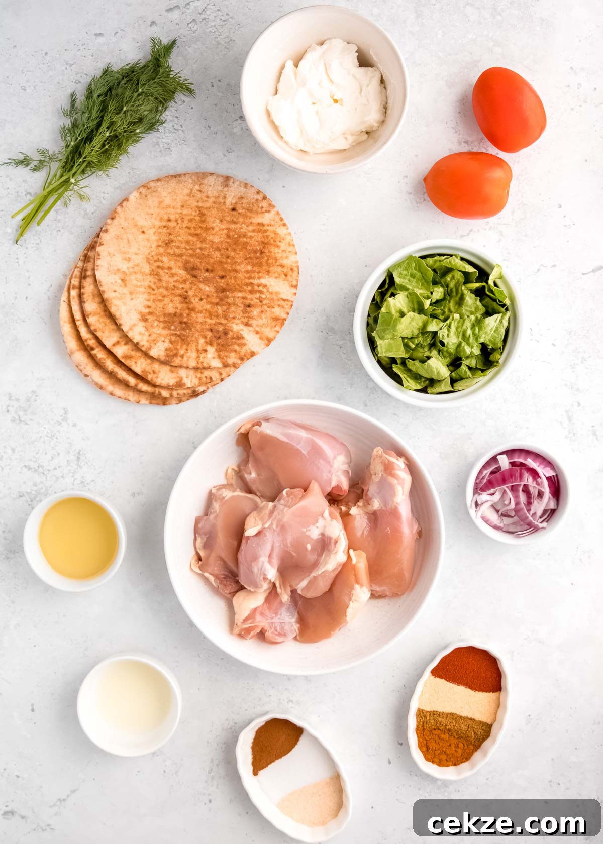 chicken shawarma ingredients on a white table